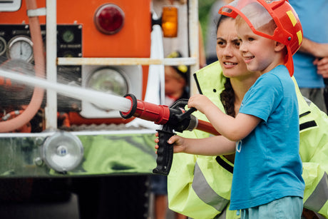 Fire hose tagert practice is great fun at the MOTAT Fire Rescue day
