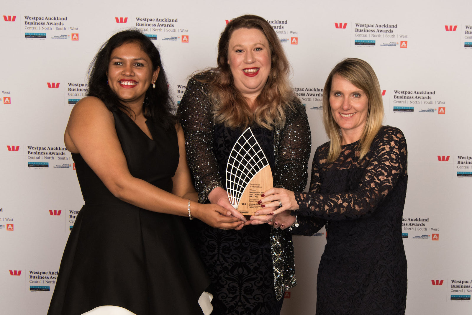 Members of the MOTAT Marketing and Communictions team accept the Award for Excellence in Marketing. From left Ashlene Cardoza Danielle Dunn Manager and Vanessa Hefer